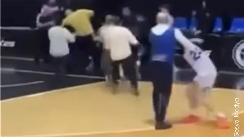 A parent attacks a Turkish player during a European Youth Basketball League match in Italy